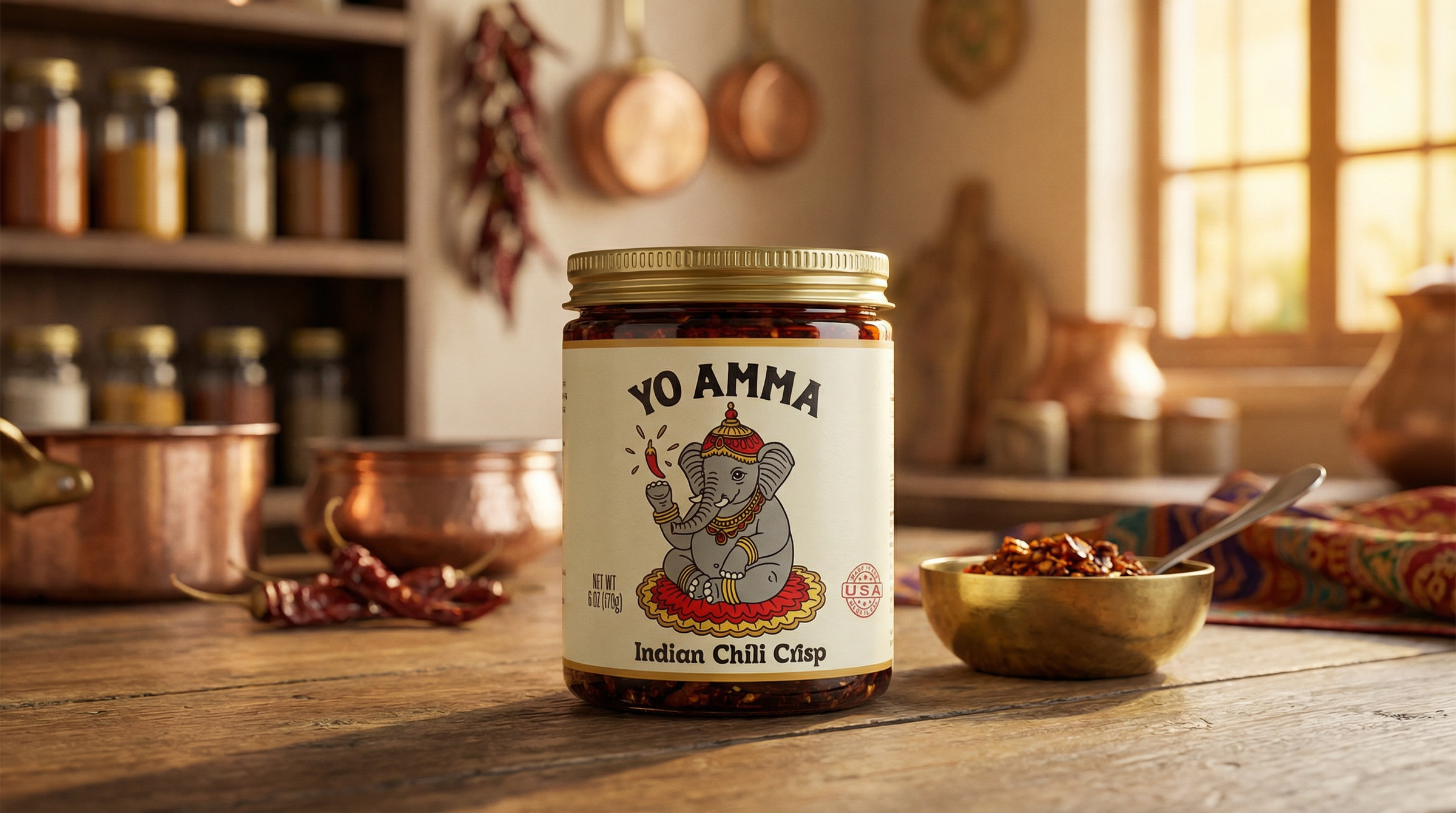 YoAmma Indian Chili Crisp jar on a warm home kitchen counter